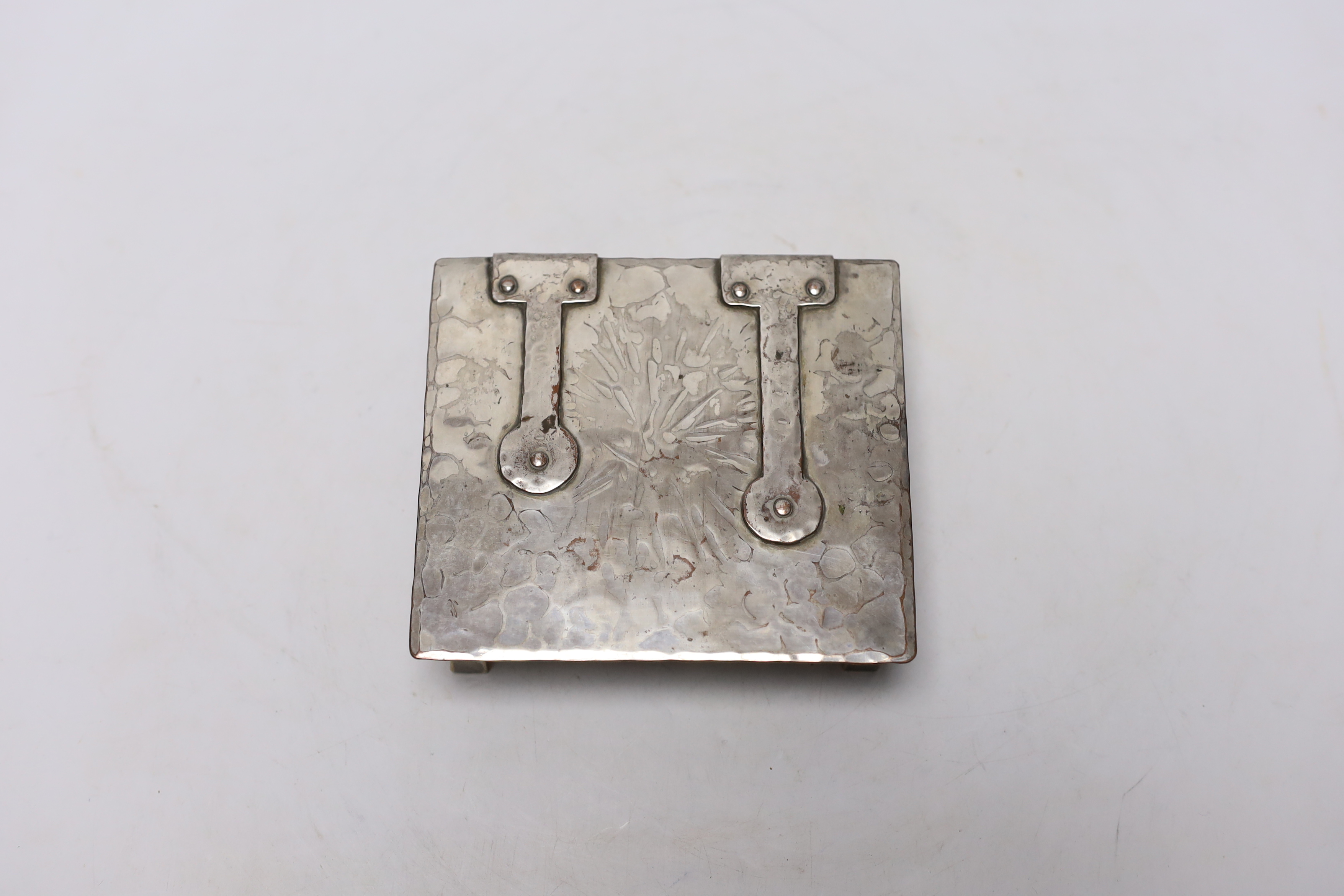 An Arts & Crafts silver plated box, with strap hinges and hammered finish, 13 x 11.5 x 4cm